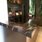 Etched and stained bar top before Clearstone